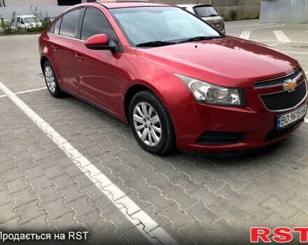 Красный Шевроле Круз, объемом двигателя 1.4 л и пробегом 235 тыс. км за 6400 $, фото 1 на Automoto.ua