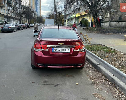 Красный Шевроле Круз, объемом двигателя 1.36 л и пробегом 204 тыс. км за 5399 $, фото 8 на Automoto.ua
