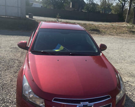 Красный Шевроле Круз, объемом двигателя 1.36 л и пробегом 200 тыс. км за 7300 $, фото 1 на Automoto.ua