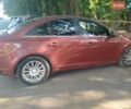 Красный Шевроле Круз, объемом двигателя 1.36 л и пробегом 220 тыс. км за 6300 $, фото 1 на Automoto.ua