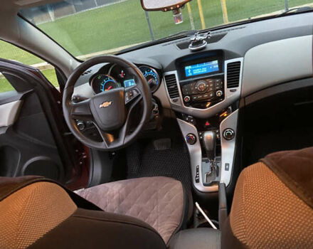 Красный Шевроле Круз, объемом двигателя 1.8 л и пробегом 266 тыс. км за 6250 $, фото 7 на Automoto.ua