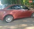 Красный Шевроле Круз, объемом двигателя 1.36 л и пробегом 220 тыс. км за 6300 $, фото 1 на Automoto.ua