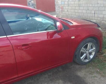 Красный Шевроле Круз, объемом двигателя 1.36 л и пробегом 142 тыс. км за 7000 $, фото 6 на Automoto.ua