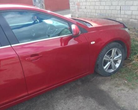 Красный Шевроле Круз, объемом двигателя 1.36 л и пробегом 142 тыс. км за 7000 $, фото 8 на Automoto.ua