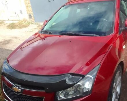 Красный Шевроле Круз, объемом двигателя 1.36 л и пробегом 142 тыс. км за 7200 $, фото 10 на Automoto.ua