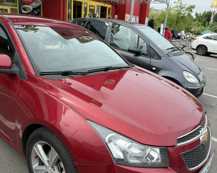 Красный Шевроле Круз, объемом двигателя 1.36 л и пробегом 220 тыс. км за 7500 $, фото 5 на Automoto.ua