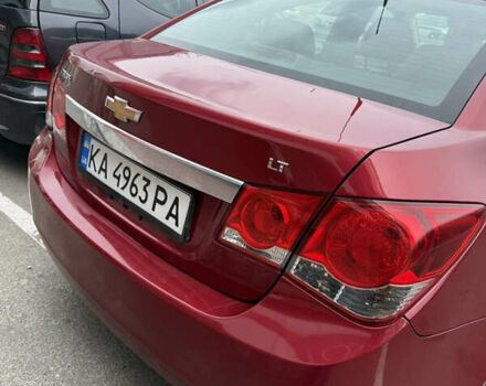 Красный Шевроле Круз, объемом двигателя 1.36 л и пробегом 220 тыс. км за 7500 $, фото 2 на Automoto.ua