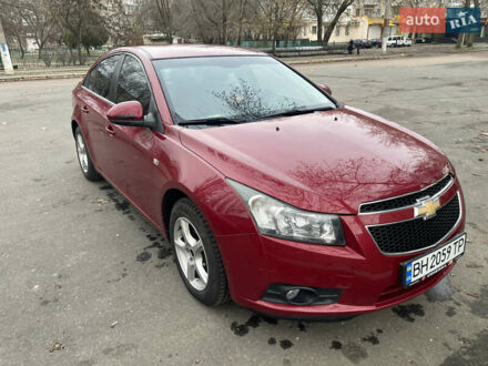 Шевроле Круз 2011 в Николаеве на Automoto.ua Красный Шевроле Круз, объемом двигателя 1.8 л и пробегом 160 тыс. км за 7000 $, фото 1 на Automoto.ua