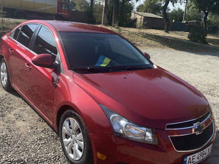 Красный Шевроле Круз, объемом двигателя 1.36 л и пробегом 200 тыс. км за 7300 $, фото 1 на Automoto.ua