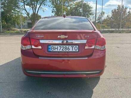 Красный Шевроле Круз, объемом двигателя 1.36 л и пробегом 232 тыс. км за 8300 $, фото 1 на Automoto.ua