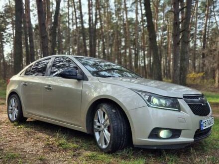 Желтый Шевроле Круз, объемом двигателя 1.36 л и пробегом 232 тыс. км за 7700 $, фото 1 на Automoto.ua