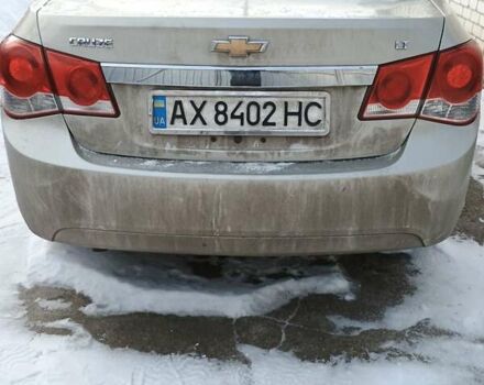 Желтый Шевроле Круз, объемом двигателя 1.36 л и пробегом 250 тыс. км за 6500 $, фото 1 на Automoto.ua
