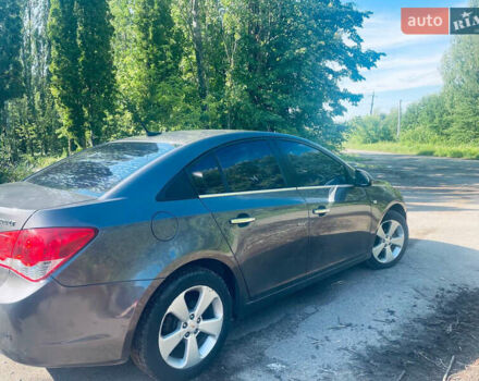 Серый Шевроле Круз, объемом двигателя 1.79 л и пробегом 180 тыс. км за 6500 $, фото 11 на Automoto.ua