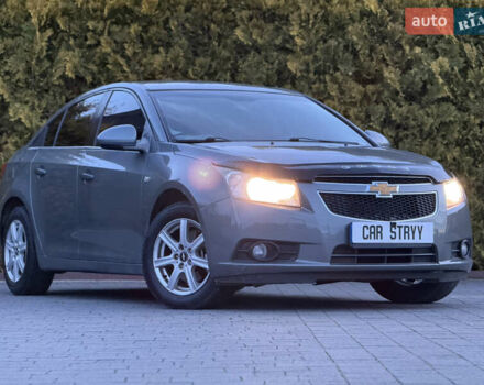 Сірий Шевроле Круз, об'ємом двигуна 2 л та пробігом 241 тис. км за 5999 $, фото 6 на Automoto.ua