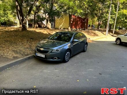 Серый Шевроле Круз, объемом двигателя 1.8 л и пробегом 128 тыс. км за 6500 $, фото 1 на Automoto.ua