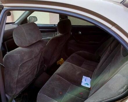 Бежевий Шевроле Епіка, об'ємом двигуна 2 л та пробігом 250 тис. км за 3500 $, фото 5 на Automoto.ua