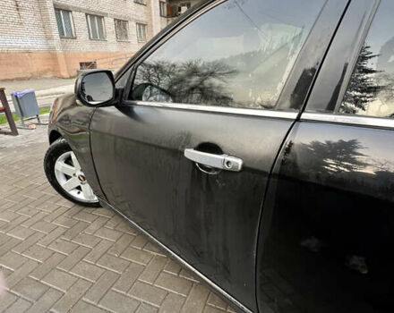 Черный Шевроле Эпика, объемом двигателя 1.99 л и пробегом 289 тыс. км за 3950 $, фото 12 на Automoto.ua