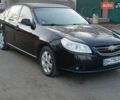 Черный Шевроле Эпика, объемом двигателя 1.99 л и пробегом 280 тыс. км за 3000 $, фото 1 на Automoto.ua