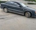 Чорний Шевроле Епіка, об'ємом двигуна 2 л та пробігом 293 тис. км за 1600 $, фото 1 на Automoto.ua