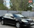 Черный Шевроле Эпика, объемом двигателя 2.49 л и пробегом 130 тыс. км за 2750 $, фото 1 на Automoto.ua