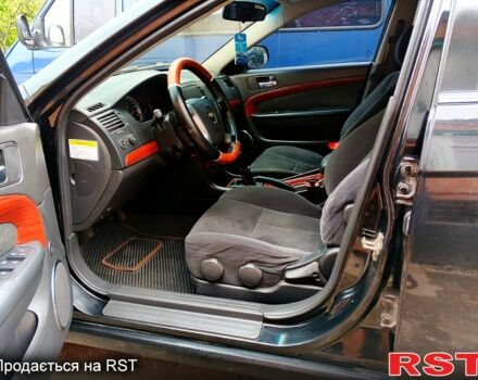 Черный Шевроле Эпика, объемом двигателя 2 л и пробегом 140 тыс. км за 5650 $, фото 7 на Automoto.ua