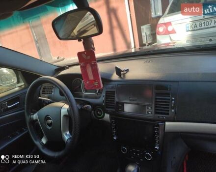 Черный Шевроле Эпика, объемом двигателя 2.5 л и пробегом 230 тыс. км за 5499 $, фото 5 на Automoto.ua