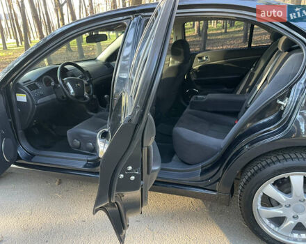 Черный Шевроле Эпика, объемом двигателя 2 л и пробегом 190 тыс. км за 4950 $, фото 65 на Automoto.ua