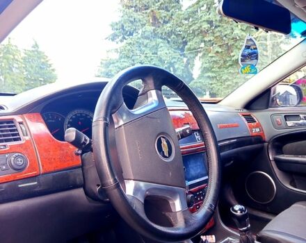 Черный Шевроле Эпика, объемом двигателя 2 л и пробегом 210 тыс. км за 4200 $, фото 4 на Automoto.ua