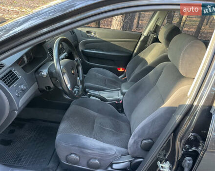 Черный Шевроле Эпика, объемом двигателя 2 л и пробегом 190 тыс. км за 4950 $, фото 80 на Automoto.ua