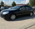 Чорний Шевроле Епіка, об'ємом двигуна 2 л та пробігом 260 тис. км за 5800 $, фото 1 на Automoto.ua
