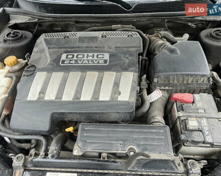 Черный Шевроле Эпика, объемом двигателя 1.99 л и пробегом 137 тыс. км за 6500 $, фото 1 на Automoto.ua