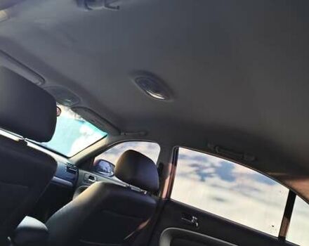 Коричневий Шевроле Епіка, об'ємом двигуна 1.99 л та пробігом 176 тис. км за 6000 $, фото 19 на Automoto.ua