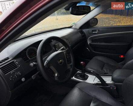 Красный Шевроле Эпика, объемом двигателя 2 л и пробегом 236 тыс. км за 4300 $, фото 22 на Automoto.ua