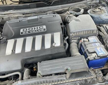 Синий Шевроле Эпика, объемом двигателя 2.49 л и пробегом 230 тыс. км за 5200 $, фото 4 на Automoto.ua