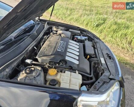 Зеленый Шевроле Эпика, объемом двигателя 2 л и пробегом 51 тыс. км за 7500 $, фото 10 на Automoto.ua