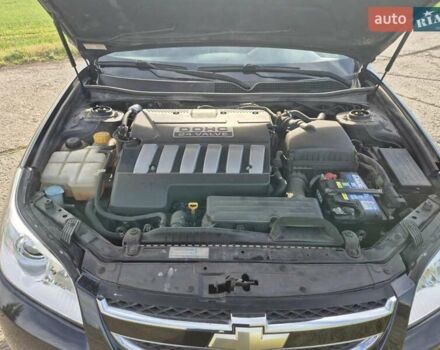 Зеленый Шевроле Эпика, объемом двигателя 2 л и пробегом 51 тыс. км за 7500 $, фото 9 на Automoto.ua