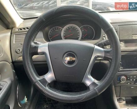 Зелений Шевроле Епіка, об'ємом двигуна 2 л та пробігом 312 тис. км за 5290 $, фото 12 на Automoto.ua