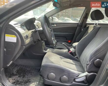 Зелений Шевроле Епіка, об'ємом двигуна 2 л та пробігом 312 тис. км за 5290 $, фото 8 на Automoto.ua