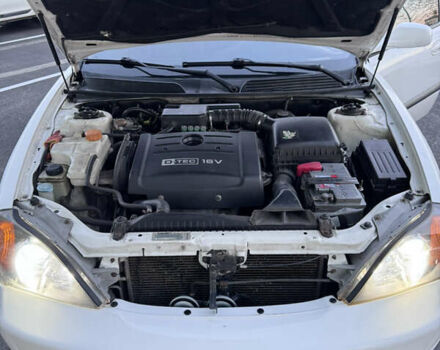 Белый Шевроле Эванда, объемом двигателя 2 л и пробегом 257 тыс. км за 4400 $, фото 14 на Automoto.ua
