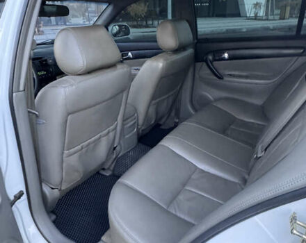 Белый Шевроле Эванда, объемом двигателя 2 л и пробегом 257 тыс. км за 4400 $, фото 10 на Automoto.ua