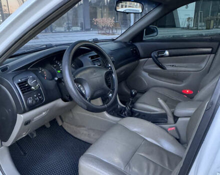 Белый Шевроле Эванда, объемом двигателя 2 л и пробегом 257 тыс. км за 4400 $, фото 12 на Automoto.ua