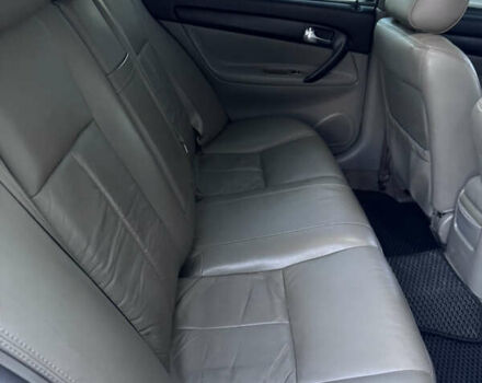 Белый Шевроле Эванда, объемом двигателя 2 л и пробегом 257 тыс. км за 4400 $, фото 9 на Automoto.ua