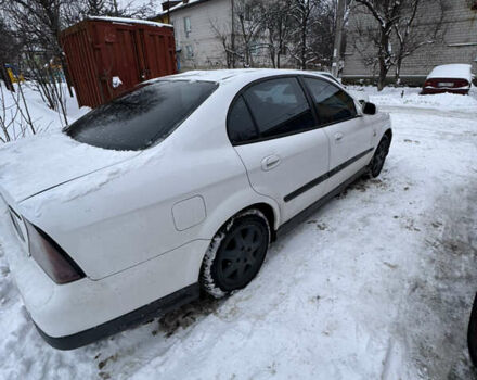 Белый Шевроле Эванда, объемом двигателя 2 л и пробегом 300 тыс. км за 3399 $, фото 1 на Automoto.ua