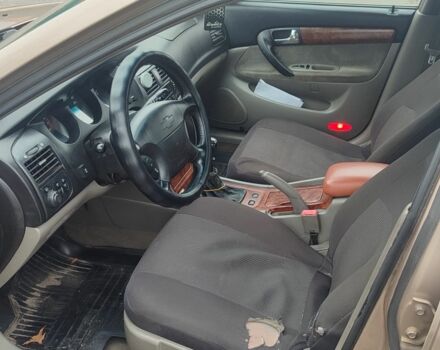 Бежевый Шевроле Эванда, объемом двигателя 2 л и пробегом 356 тыс. км за 1500 $, фото 6 на Automoto.ua