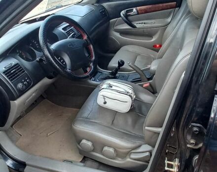 Черный Шевроле Эванда, объемом двигателя 2 л и пробегом 280 тыс. км за 2800 $, фото 6 на Automoto.ua