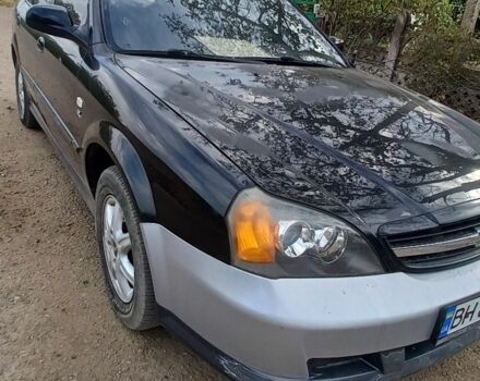 Черный Шевроле Эванда, объемом двигателя 2 л и пробегом 280 тыс. км за 2800 $, фото 2 на Automoto.ua