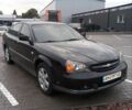 Чорний Шевроле Еванда, об'ємом двигуна 2 л та пробігом 400 тис. км за 3500 $, фото 3 на Automoto.ua