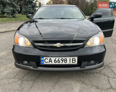 Черный Шевроле Эванда, объемом двигателя 2 л и пробегом 193 тыс. км за 4200 $, фото 33 на Automoto.ua