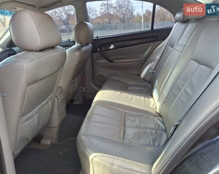 Чорний Шевроле Еванда, об'ємом двигуна 2 л та пробігом 280 тис. км за 3899 $, фото 8 на Automoto.ua