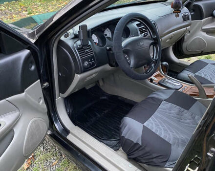 Чорний Шевроле Еванда, об'ємом двигуна 2 л та пробігом 181 тис. км за 5000 $, фото 10 на Automoto.ua